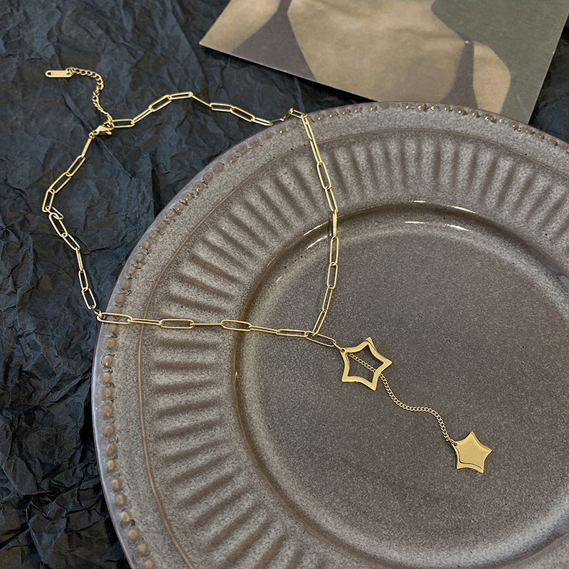 Korean-style simple and elegant hollowed-out five-pointed star tassel pendant titanium steel necklace, fashionable and versatile, personalized collarbone chain details Picture