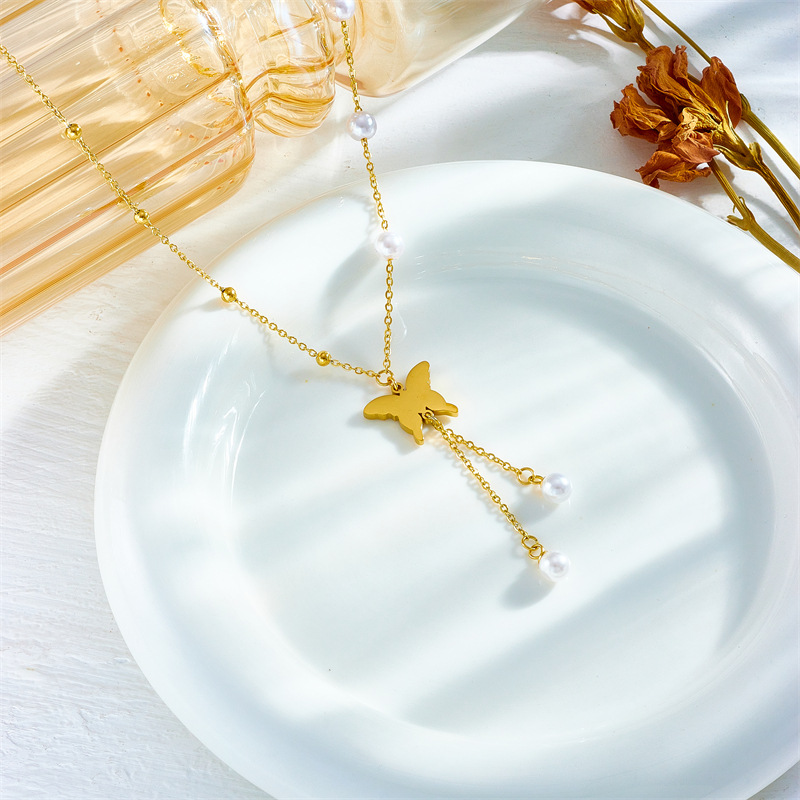 European and American fashion, retro, versatile, simple and high-end metal titanium steel tassel pearl butterfly pendant accessory necklace details Picture