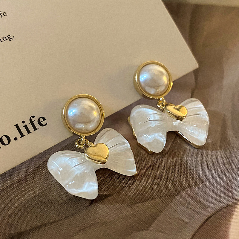 Retro and fashionable bow pearl earrings for women, 925 silver needle best-selling stud earrings, versatile, high-end and exquisite earrings full figure