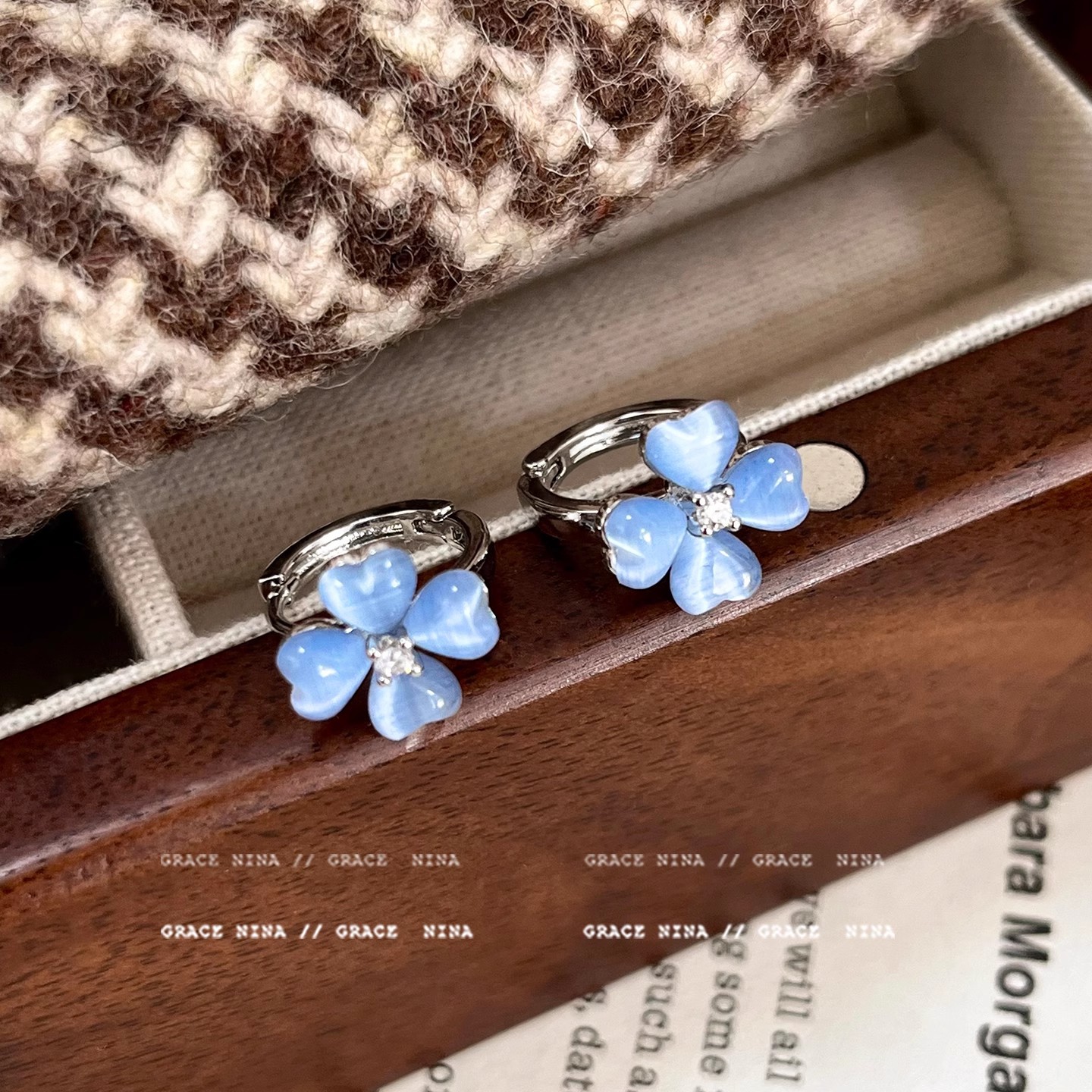 Zirconium blue lucky flower earrings, high-end and niche design, small and exquisite stud earrings, ear buckles and earrings for women in summer details Picture