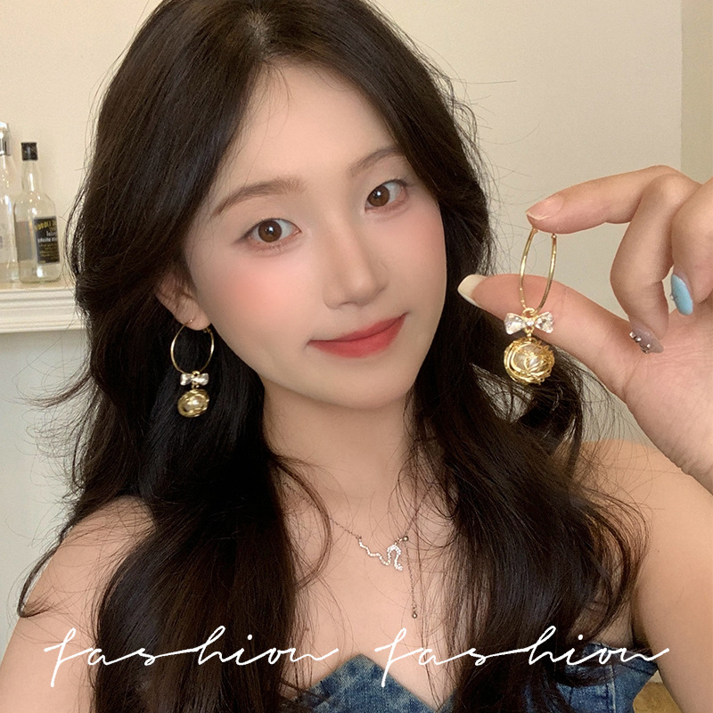High-end design sense zircon bow diamond ball ear hook light luxury earrings, Korean Internet celebrity style ear buckles and earrings for women full figure