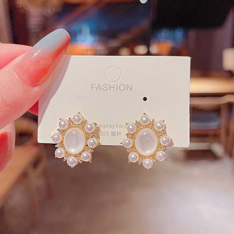 S925 Silver Needle New Round cat's eye pearl earrings for women, Korean style design, elegant and simple stud earrings details Picture