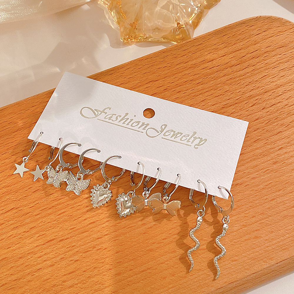 Wholesale of new cross-border butterfly imitation pearl earrings, creative and simple five-pointed star moon earrings set of 9 pairs Application Scenario