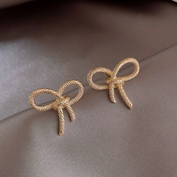 S925 Silver Needle Korean simple and compact bow earrings, metal commuter student style stud earrings full figure