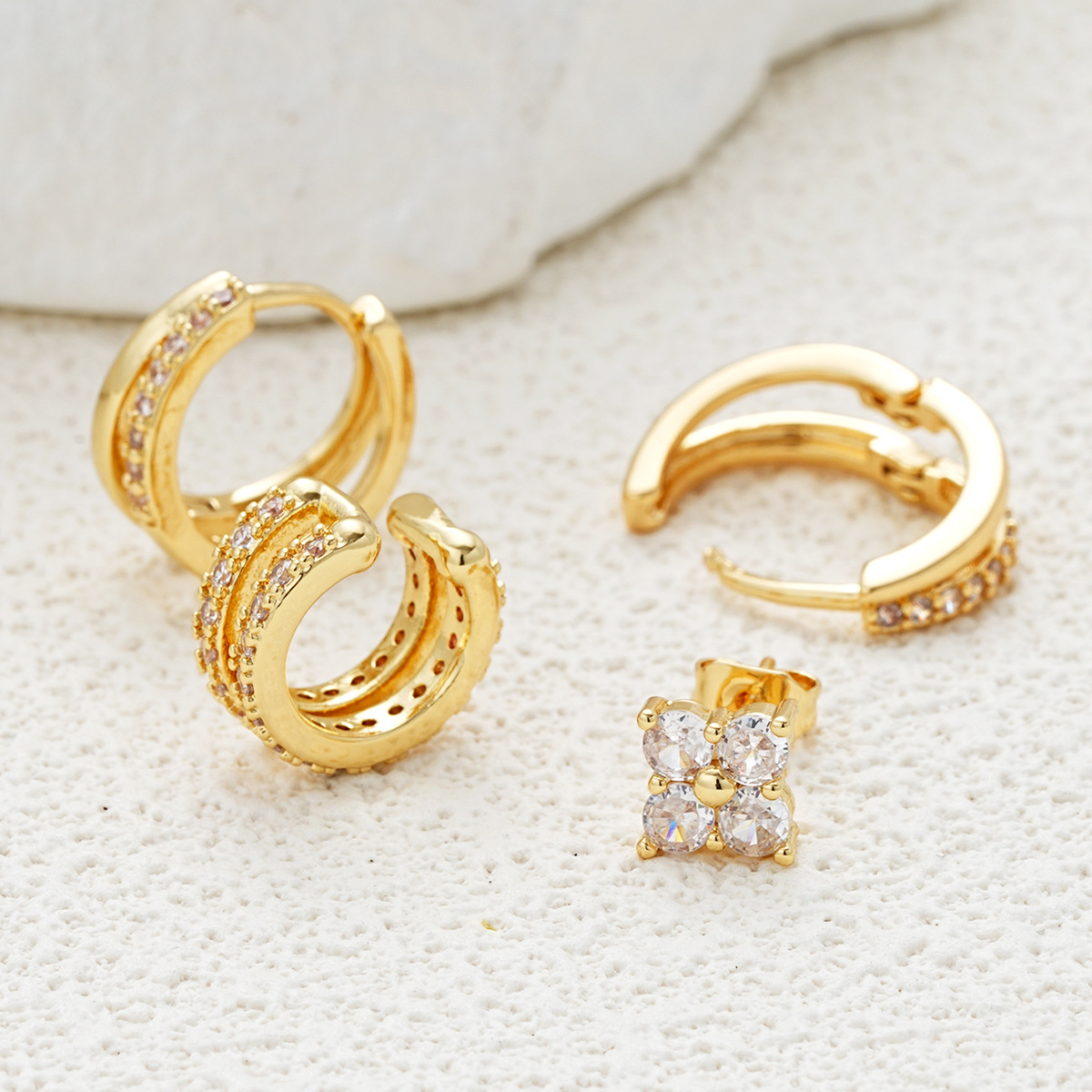 Cross-border new fully managed European and American style earrings, niche high-end creative zircon copper earrings 4-piece set/piece Application Scenario