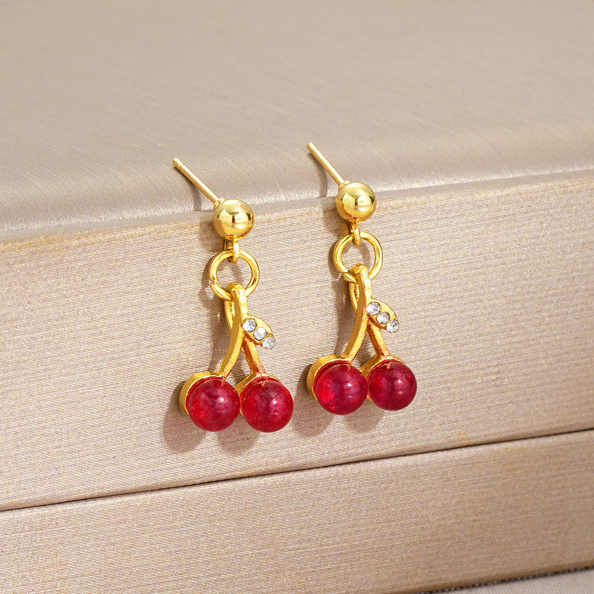 New cross-border niche and fresh red cherry earrings with a high-end and cute design. Wholesale of festive women's earrings for autumn and winter Application Scenario