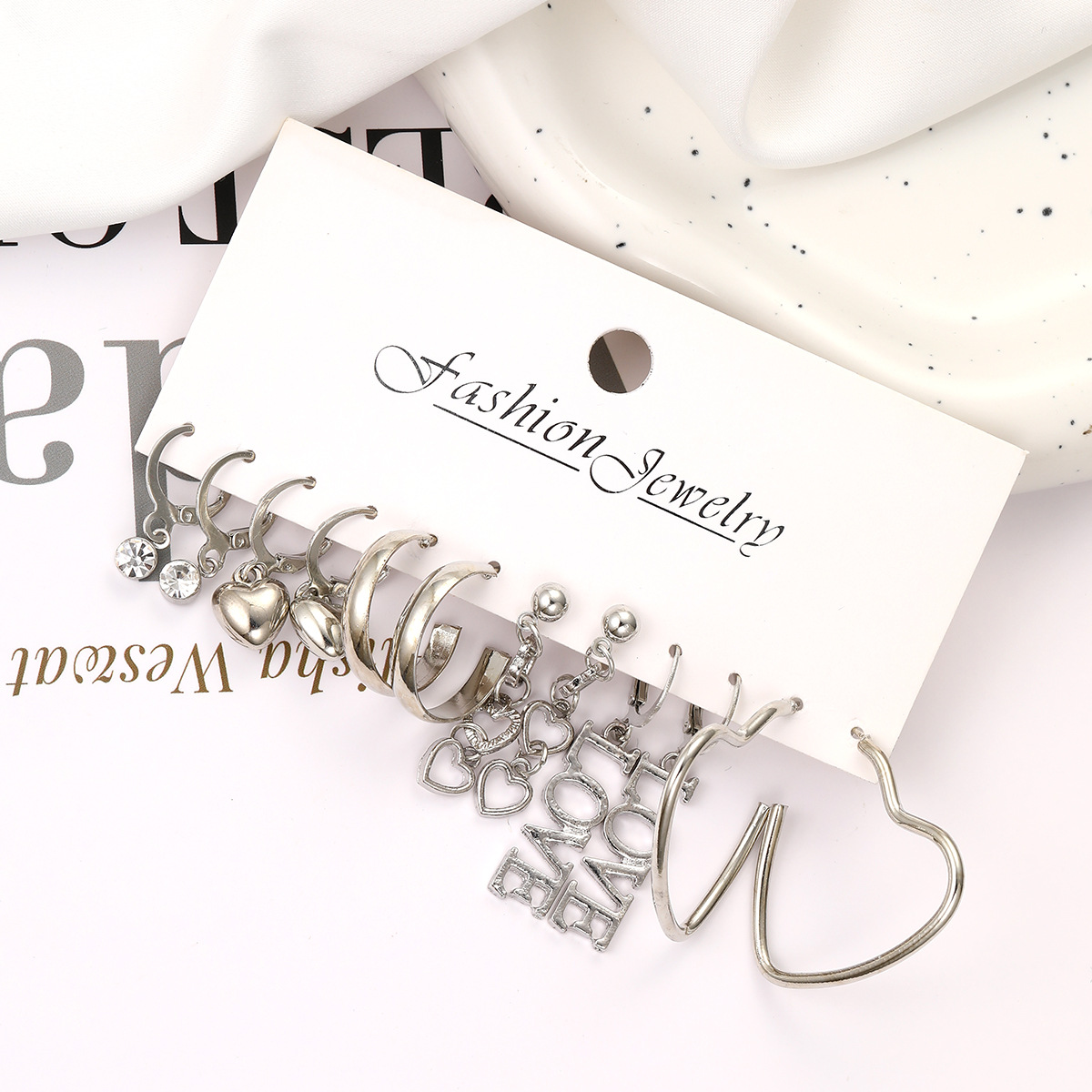 Wholesale of new cross-border silver heart-shaped earrings, creative and simple English letter "love" earring set of 6 pieces Application Scenario