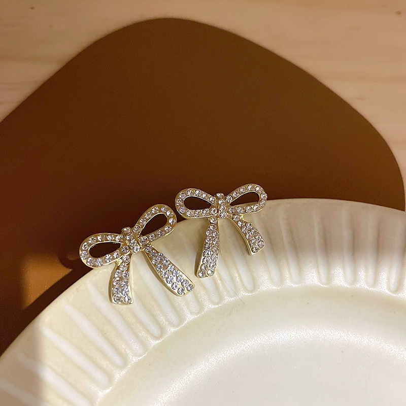 S925 silver needle simple and elegant water diamond bow stud earrings for women, a new trendy Korean Internet celebrity exquisite earrings Application Scenario