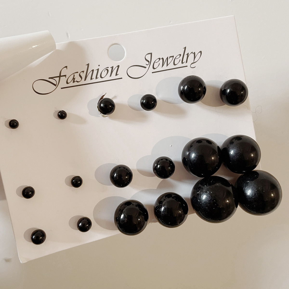 New cross-border simple and classic small and medium-sized imitation pearl stud earrings, 12 pairs in a row, fever French retro stud earrings Application Scenario