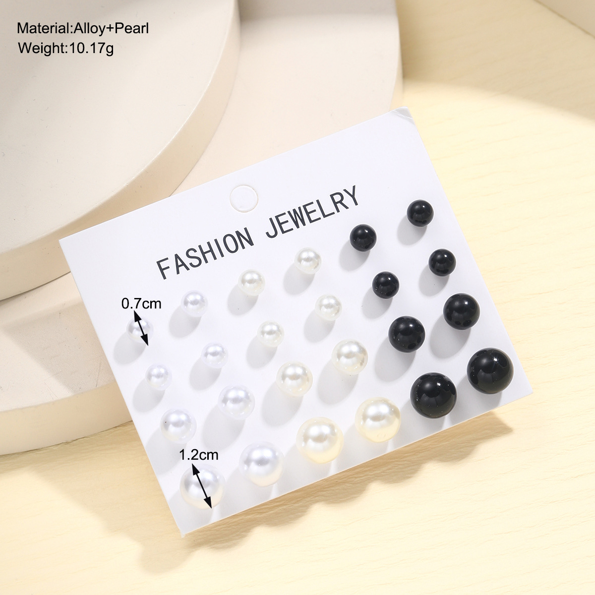 A new 12-piece set of simple European and American earrings for cross-border use, featuring a high-end retro three-color imitation pearl stud design details Picture