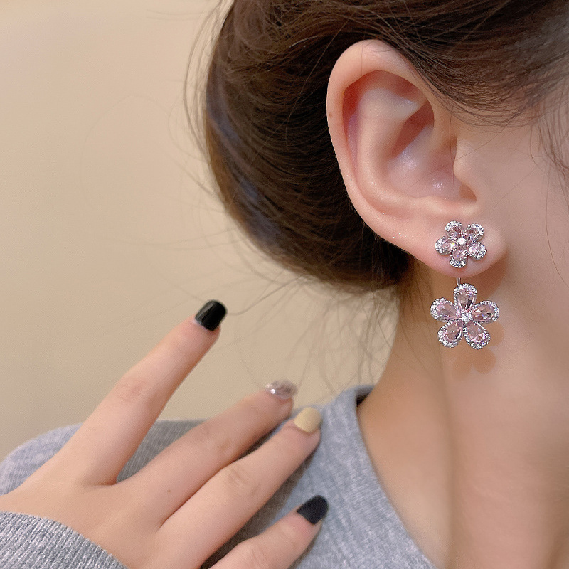 Silver needle flower earrings, with a light luxury and niche design sense, exude a high-end and elegant style. Simple stud earrings, a unique, fashionable and exquisite accessory for women details Picture