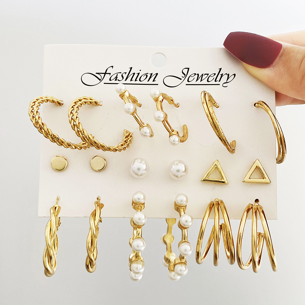 Wholesale of popular C-shaped earrings from Europe and America, creative retro imitation pearl circle earrings set of nine pieces Application Scenario