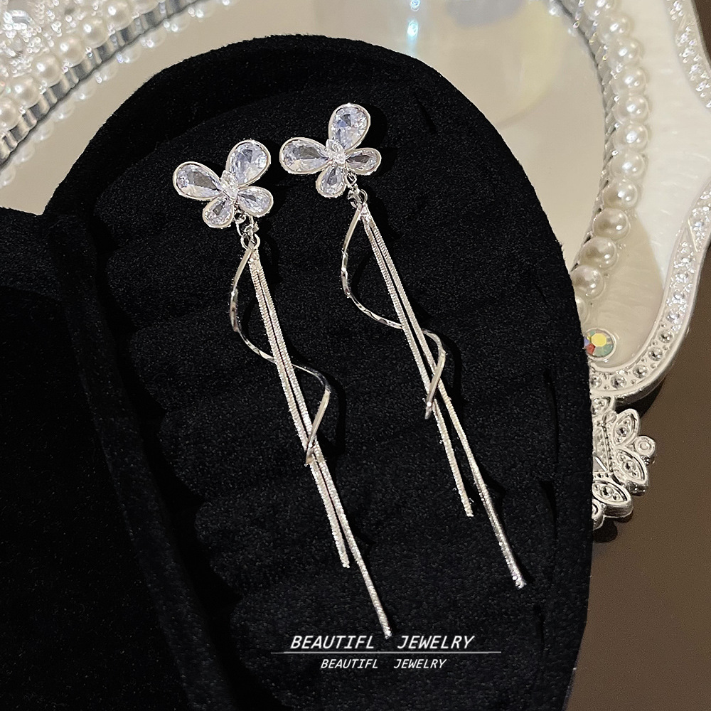 New zircon bow wavy tassel earrings, grand and exaggerated long stud earrings, versatile fairy earrings wholesale full figure