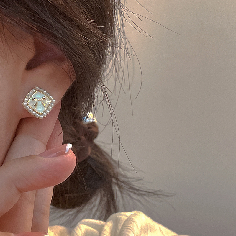 925 Silver needle Bow Pearl Earrings, a niche design for women, with a sweet and elegant style. Wholesale of high-end ear studs details Picture