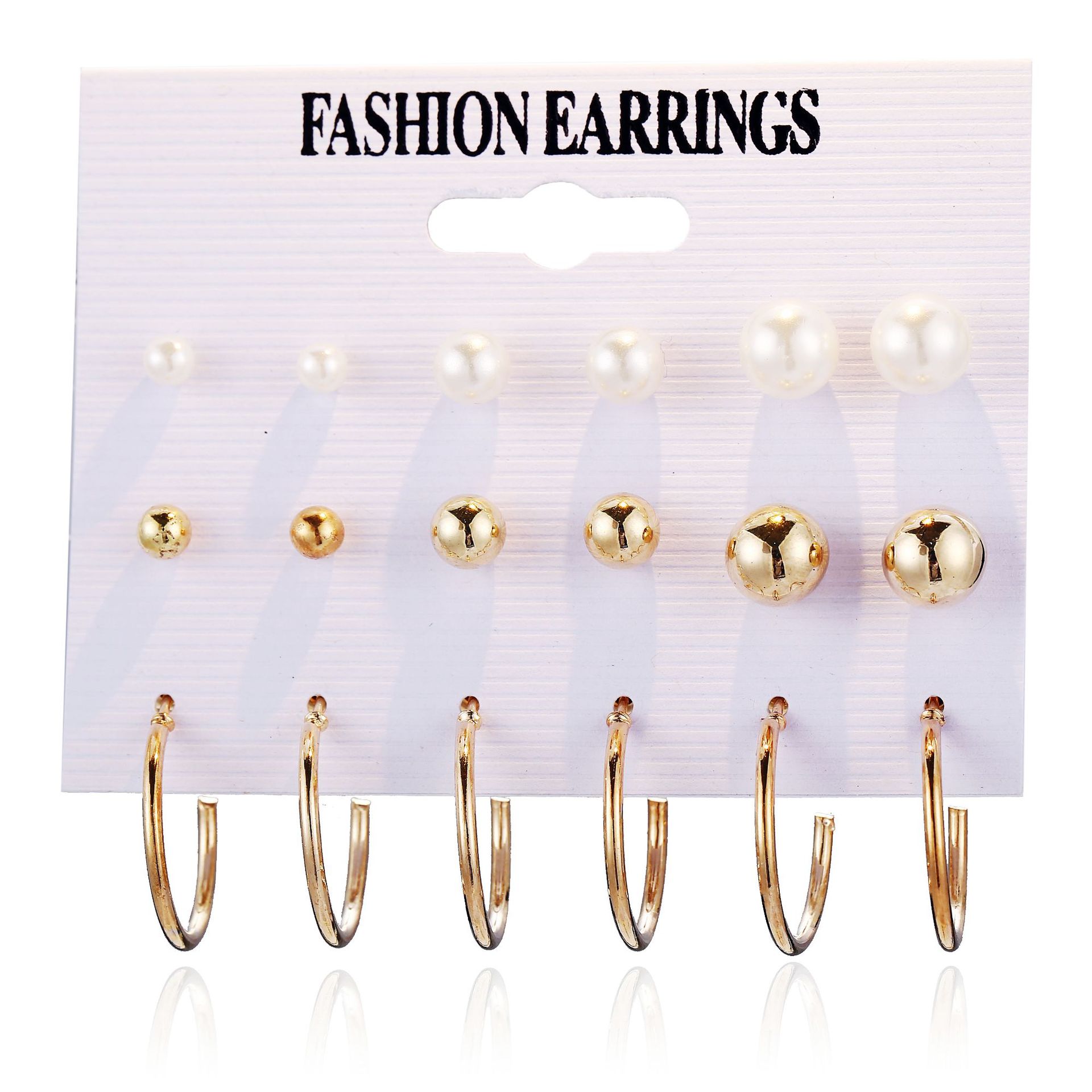 Wholesale of high-end and trendy four-prong ear studs with rhinestones from Europe and America, and design-savvy pearl-like earrings Item Picture