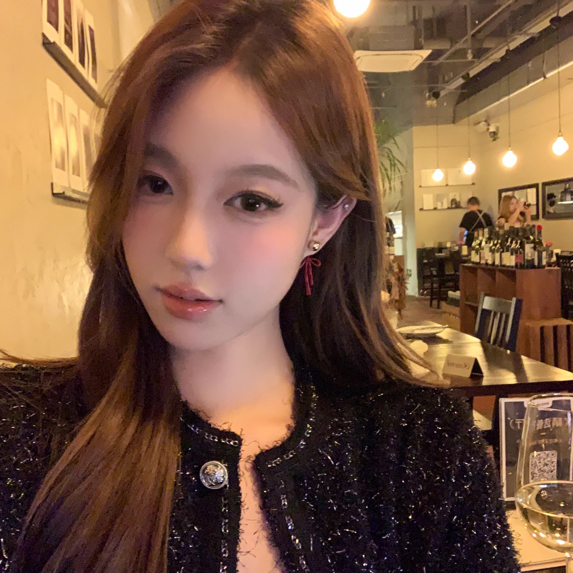 The Ankela red bow earrings exude a sense of light luxury and sophistication. They are a versatile ear accessory for women's winter New Year, with a retro charm and a trendy look details Picture