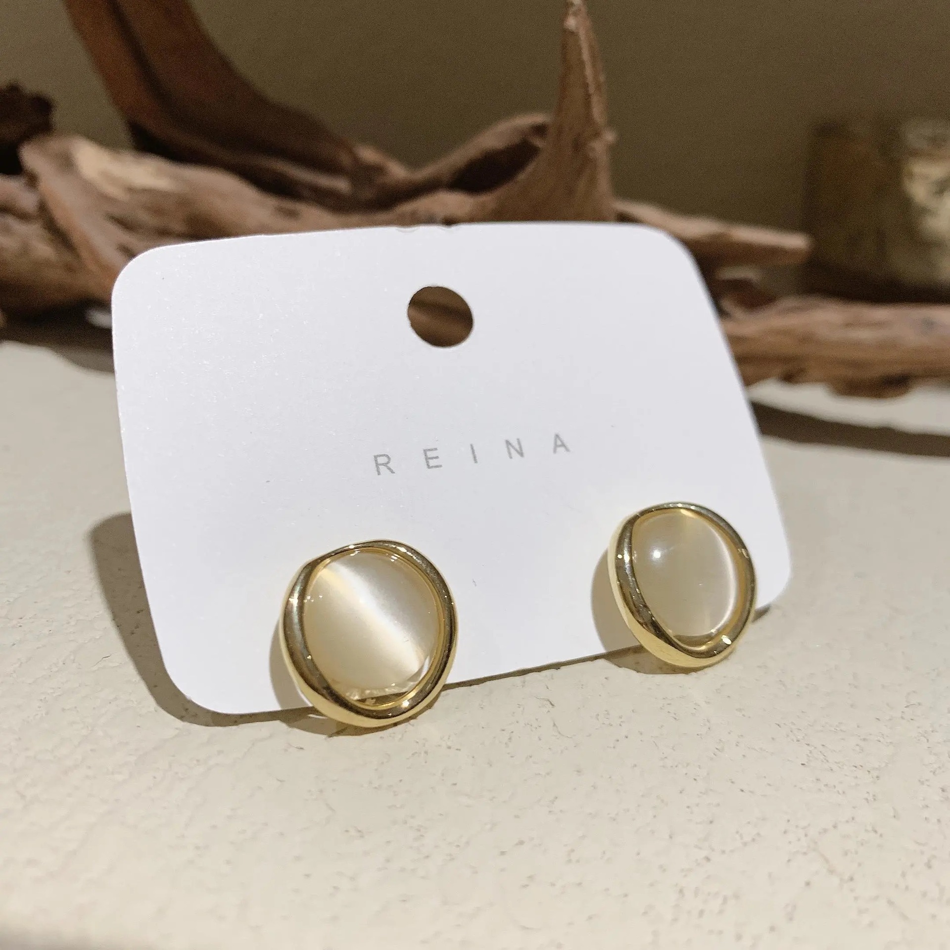 S925 Silver Needle Korean-style cat's eye stone cold style, simple and versatile, retro style stud earrings for women, wholesale from the manufacturer full figure