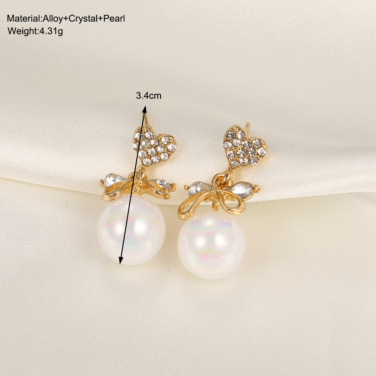 New cross-border imitation pearl bow earrings, creative C-shaped dot diamond trendy earrings, fashionable design sense earrings details Picture