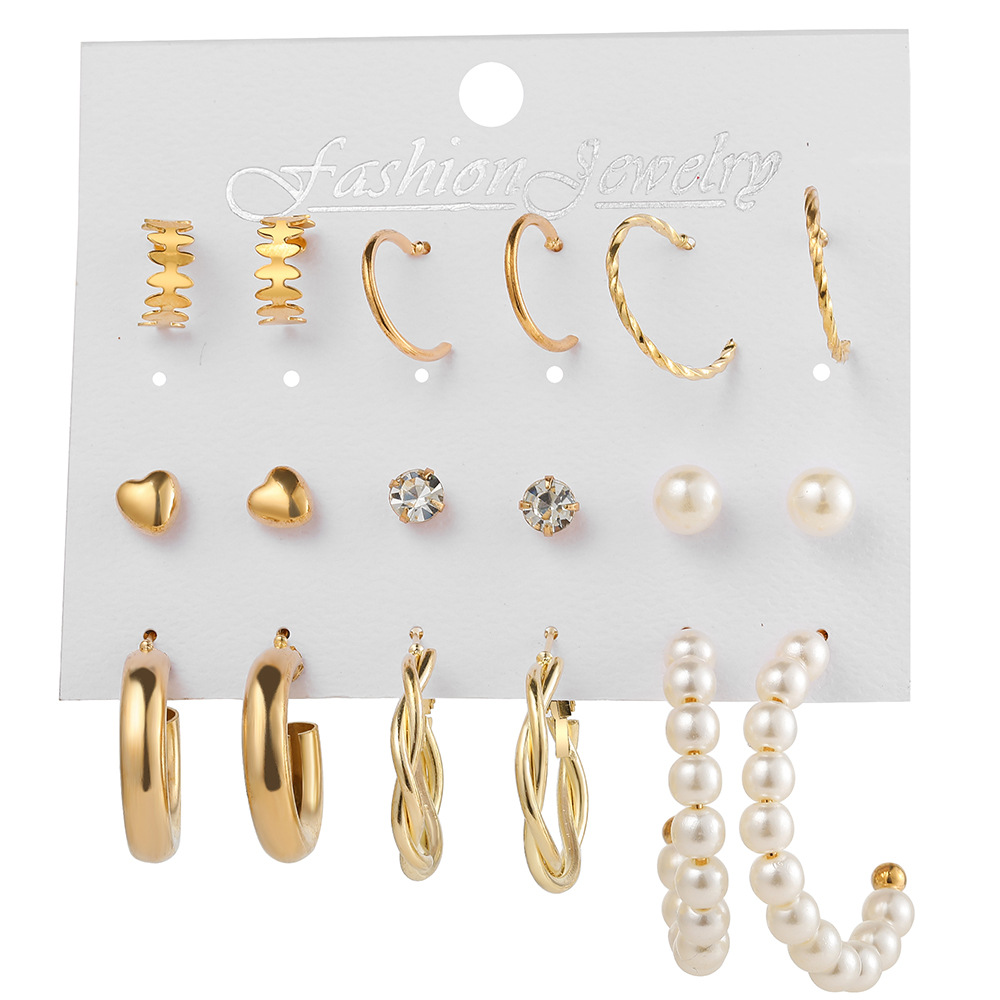 A new 9-piece set of metal twisted letter C ear rings from Europe and America, featuring a creative, retro and simple imitation pearl style Item Picture