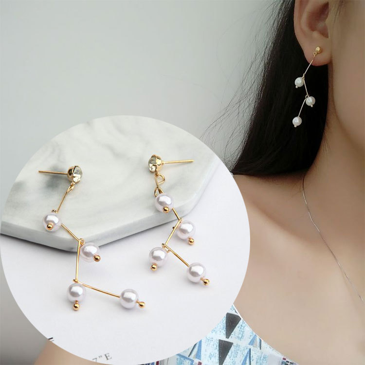 New Japanese and Korean minimalist high-gloss pearl earrings, women's tree branch curved line design, long stud fairy earrings full figure