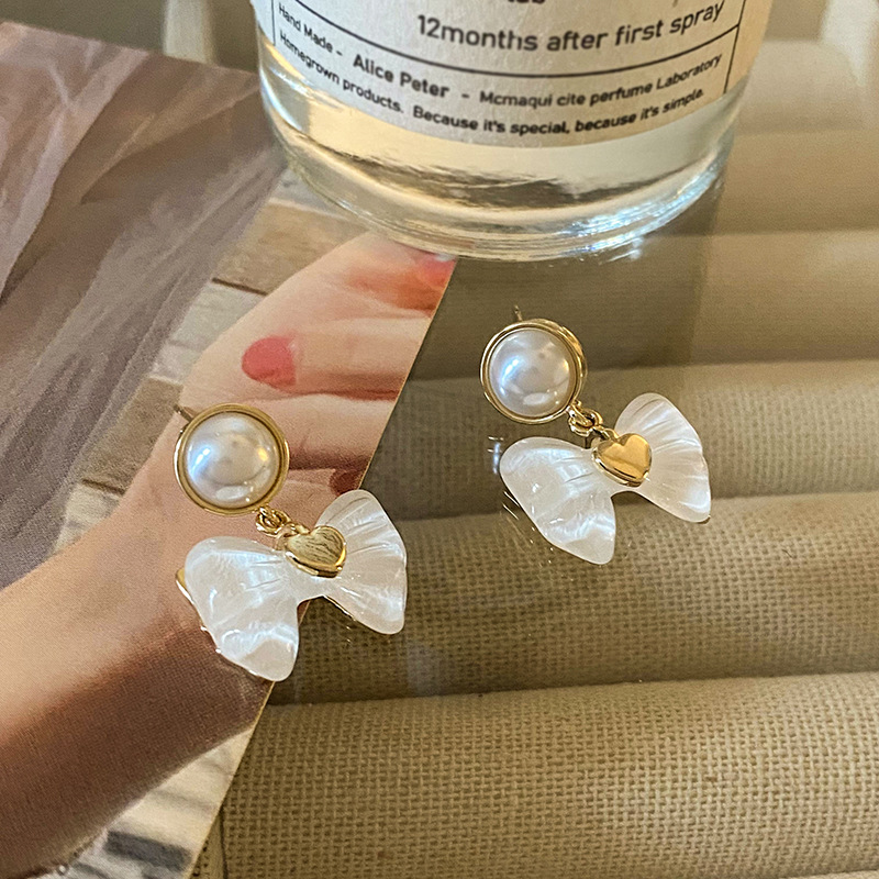 Retro and fashionable bow pearl earrings for women, 925 silver needle best-selling stud earrings, versatile, high-end and exquisite earrings Specification drawing