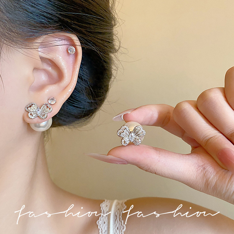The silver exquisite hollowed-out butterfly stud earrings exude a sense of light luxury and high-end elegance. The dual-wear earrings are unique and niche earrings full figure