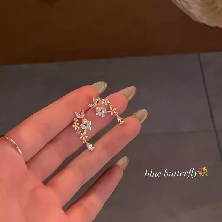 Silver needle elegance, butterfly flower pearl earrings, light luxury, niche stud earrings, women's earrings, high-end feel, Yiwu accessories wholesale full figure