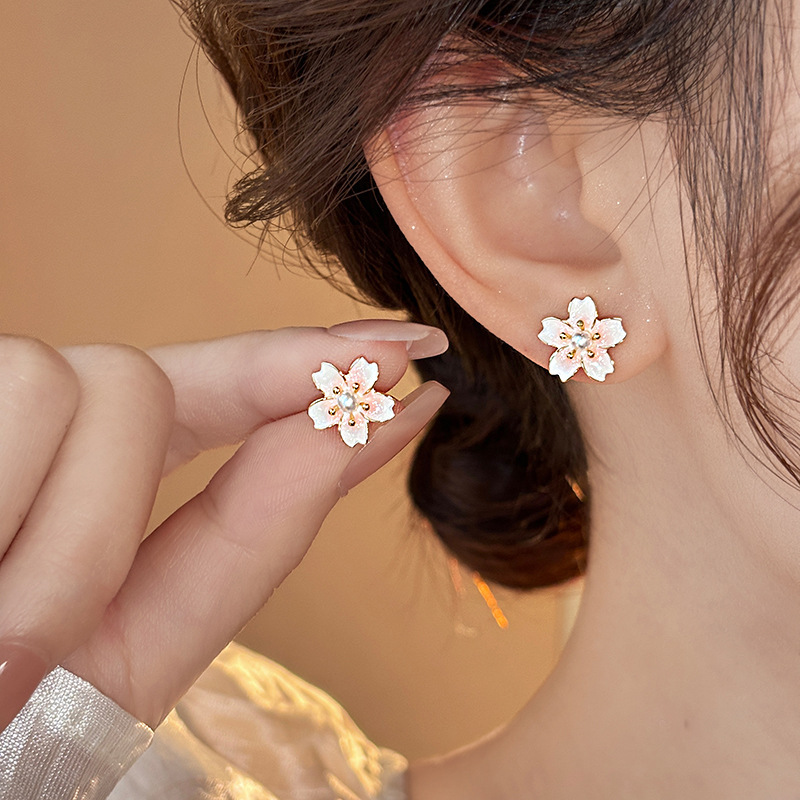 Drip glaze dyed peach blossom pearl stud earrings for women, a light luxury and high-end look, elegant and grand earrings, sweet and versatile earrings wholesale details Picture