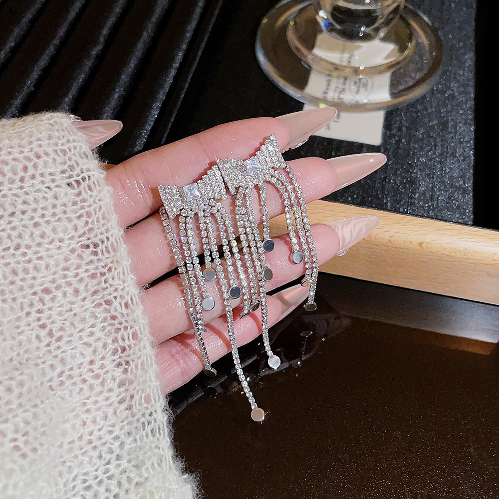 Super ethereal and exquisite bow fashion earrings, a light luxury and high-end feel, versatile style, ear bone clips, long tassel earrings for women details Picture
