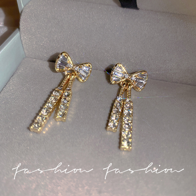 Micro-inlaid bow zircon crystal earrings, fashionable and elegant earrings, new Korean trendy design silver needle earrings for women full figure