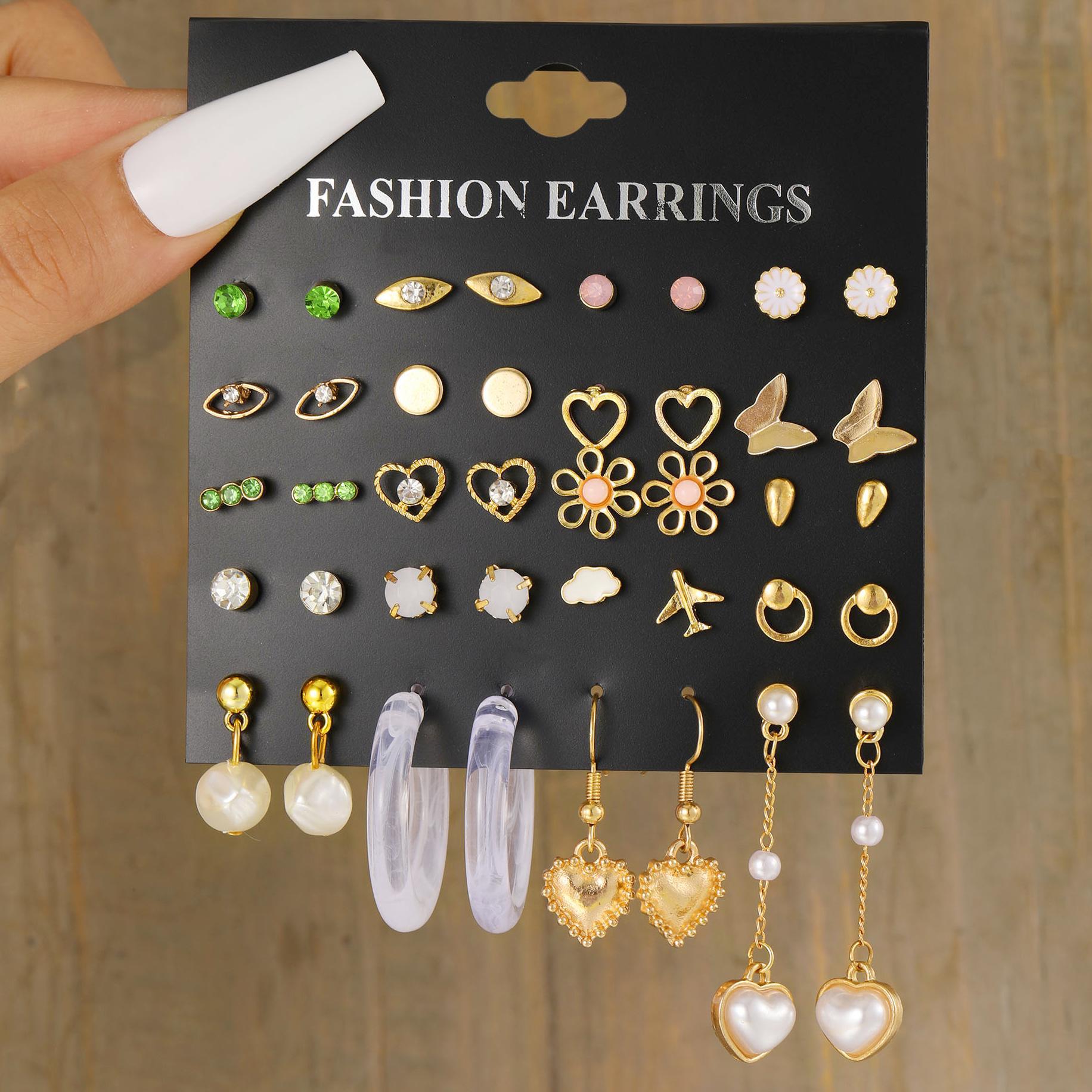 A new cross-border fashion and simple set of 20-piece heart-shaped flower butterfly stud earrings from Europe and America, featuring retro pearl earrings full figure