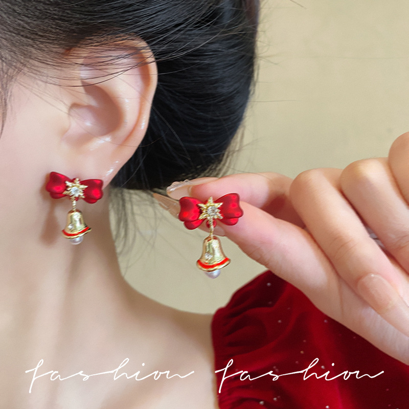 Christmas silver needle diamond-encrusted snowflake bell pearl stud earrings with a light luxury design, red bow New Year earrings details Picture