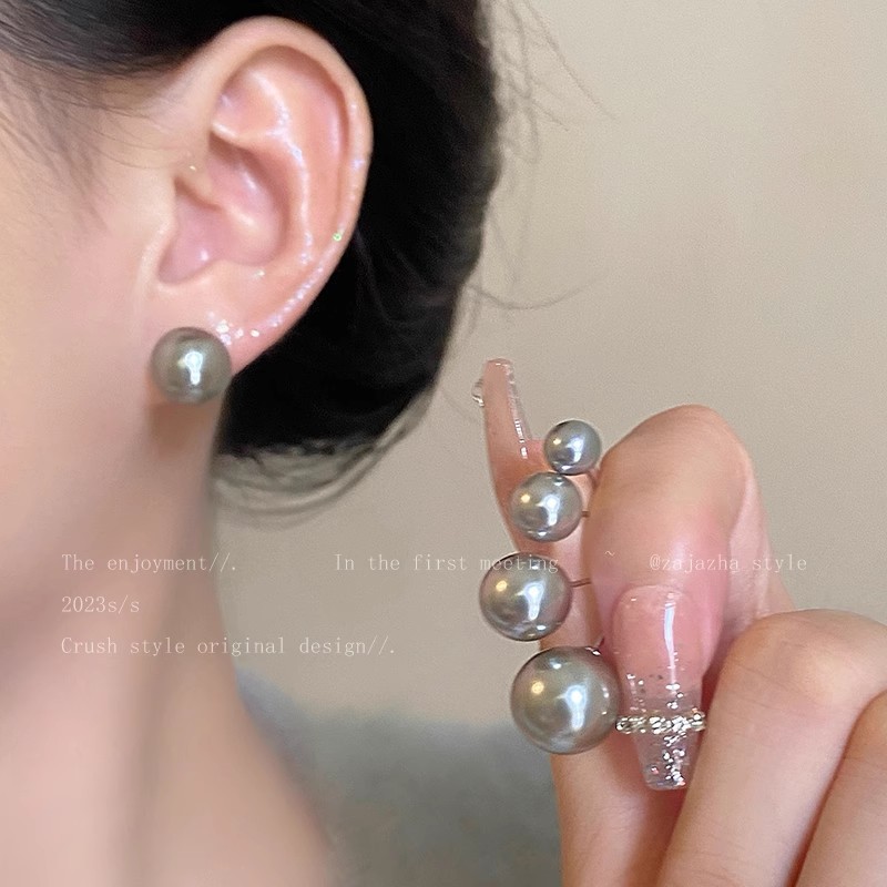 The grey pearl stud earrings are a new bestseller for women in 2025. They feature a simple and cold style with a high-end feel details Picture