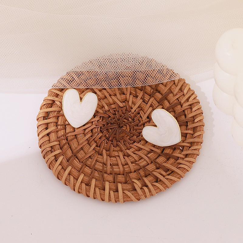 S925 Silver Needle Korean simple and niche design oil-dripping heart-shaped stud earrings New French cute trendy earrings details Picture