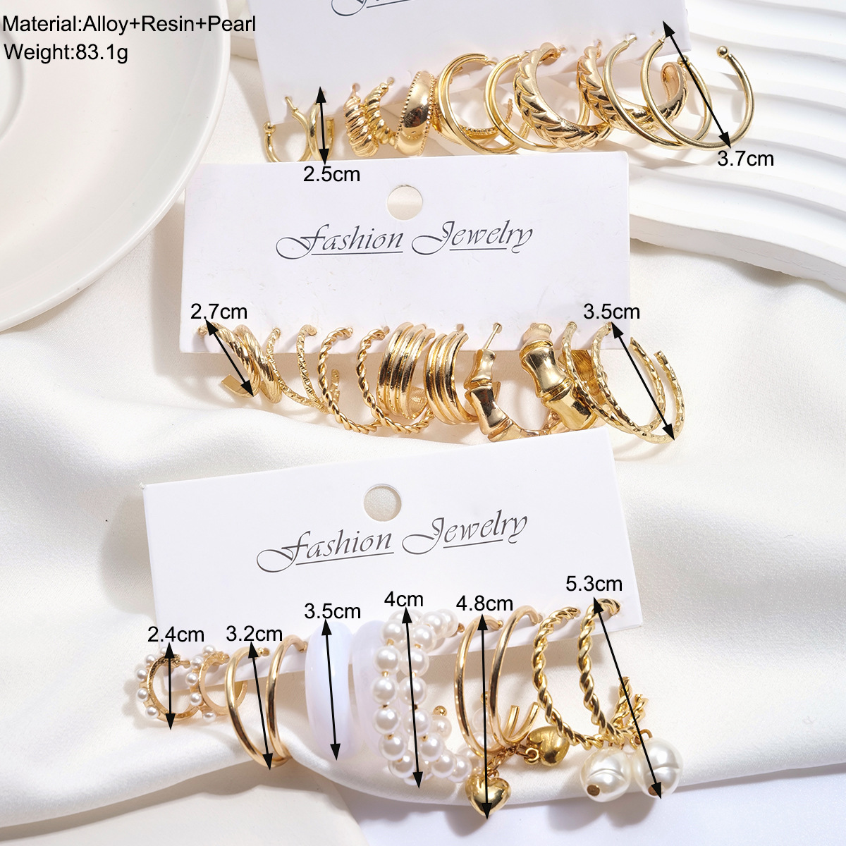 A new 18-piece set of personalized metal twisted chain spiral ear rings imitating pearl earrings from Europe and America details Picture
