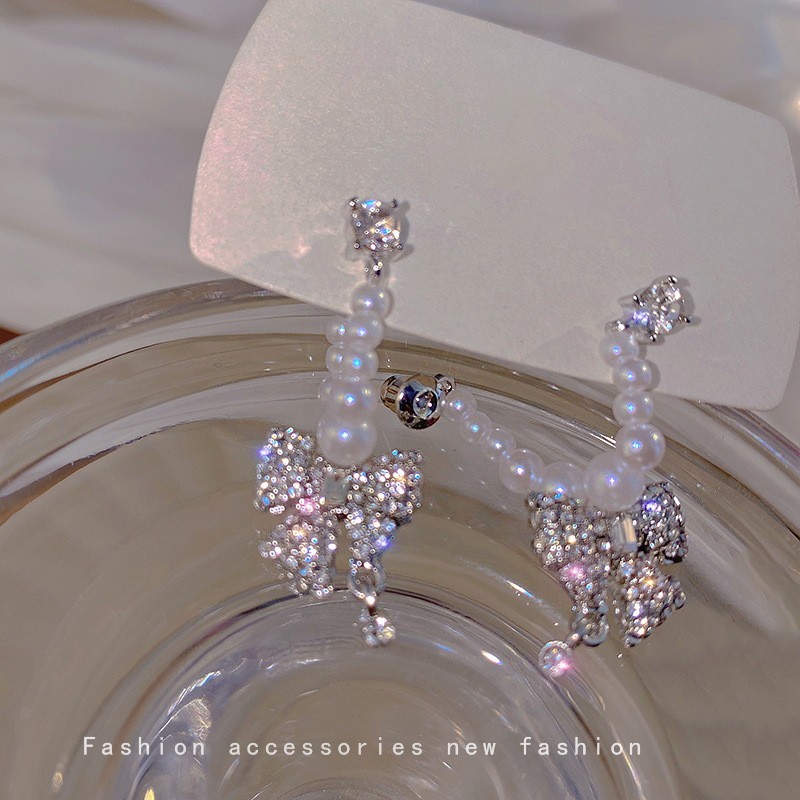 Long tassel pearl earrings from Dongdaemun, South Korea, with a cold and elegant feminine design, are light luxury earrings and diamond-encrusted bow earrings Specification drawing