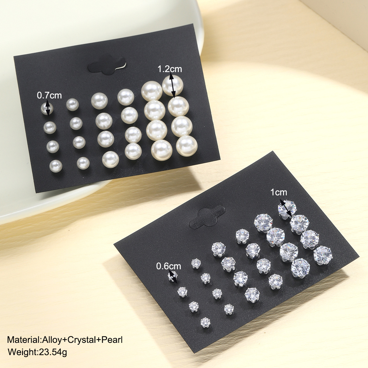 A 24-piece set of retro imitation pearl stud earrings from Europe, America and America, a new cross-border fashion and simple six-prong dot diamond earrings details Picture