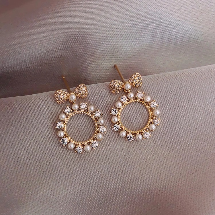 S925 Silver Needle Sweet and Fashionable circle pearl bow Tie Earrings, Korean-style bow tie small and versatile ears details Picture