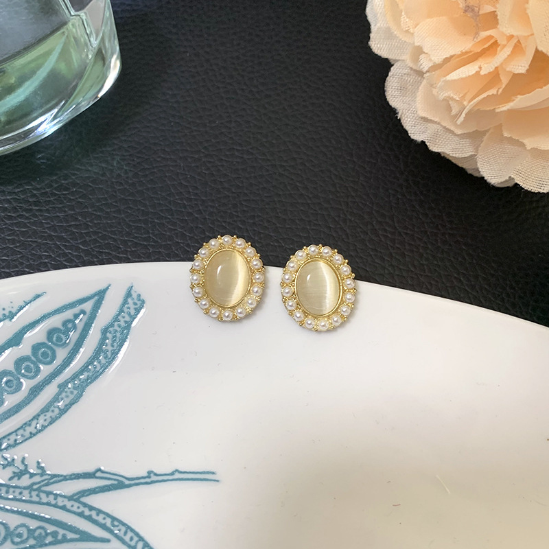 Pearl stud earrings, women's oval cat's eye stone niche retro earrings, gentle and elegant geometric earrings, 925 silver needle wholesale Specification drawing