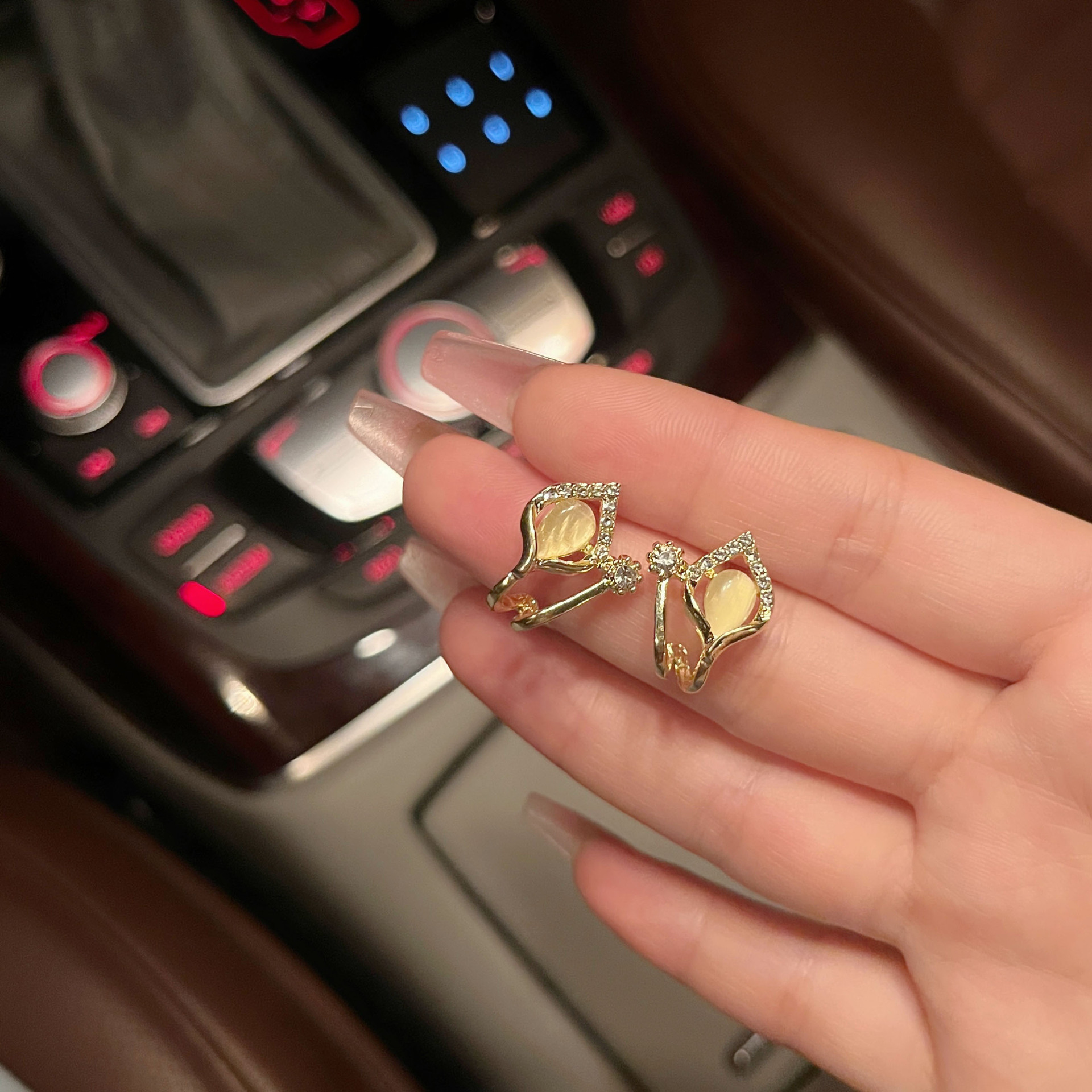 S925 Silver needle hollowed-out cat's eye stone diamond-encrusted stud earrings, new trendy and simple style silver needle earrings, small and exquisite earrings Application Scenario