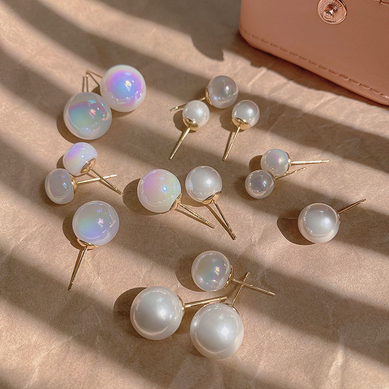 Merman-colored pearl earrings for women, a new trend with a trendy vibe, and a unique personality. The stud earrings are simple, fashionable and niche full figure