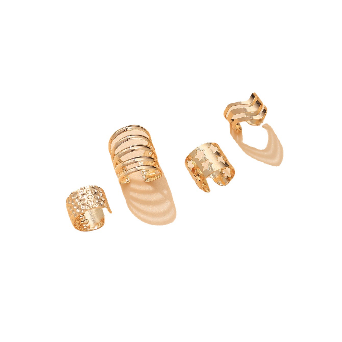 Creative and simple gold ear bone clip four-piece set, metal personalized star-shaped hollowed-out C-shaped ear clip set Item Picture