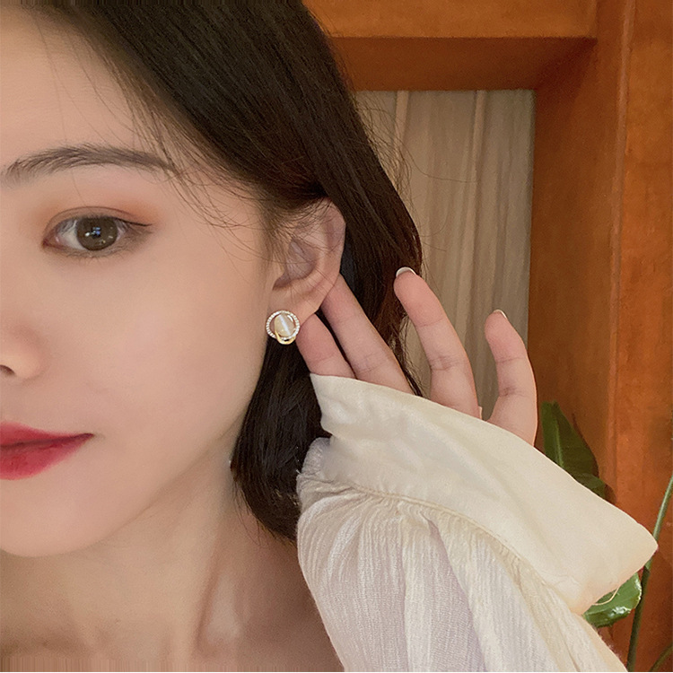 S925 Silver Needle Hong Kong-style oval cat's eye stone Stud earrings for women, spring light luxury and niche design accessory, elegant and stylish earrings details Picture