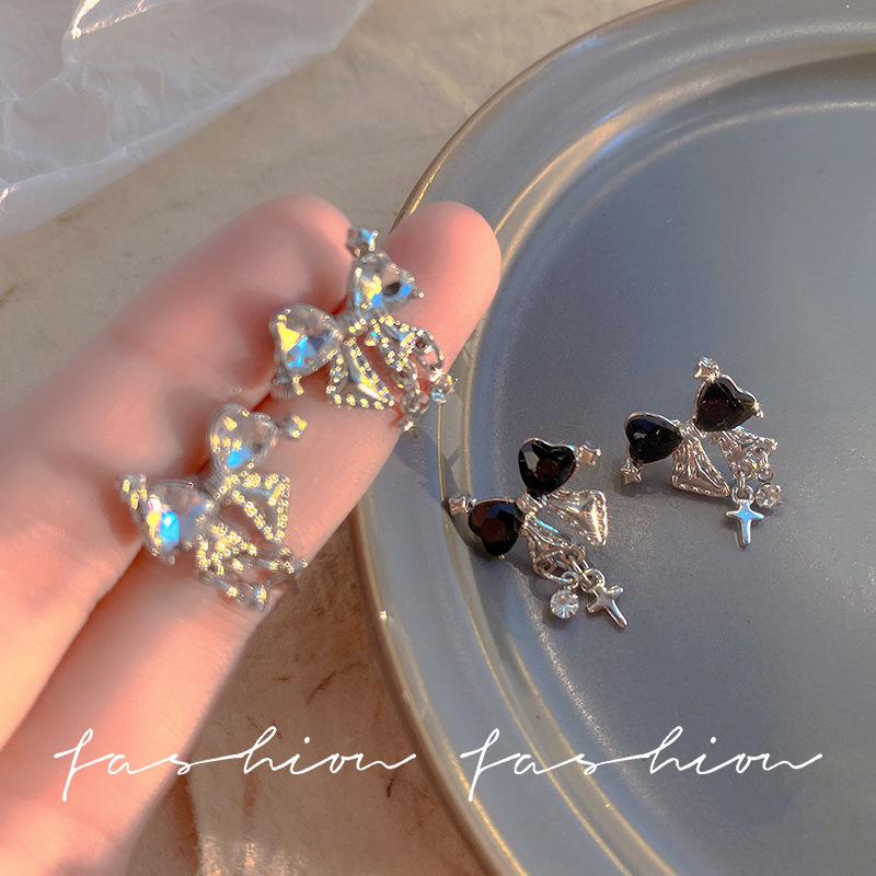 S925 Silver Needle Starlight Sparkling Bow Zircon Stud Earrings for women, a niche design with a high-end and fashionable style full figure
