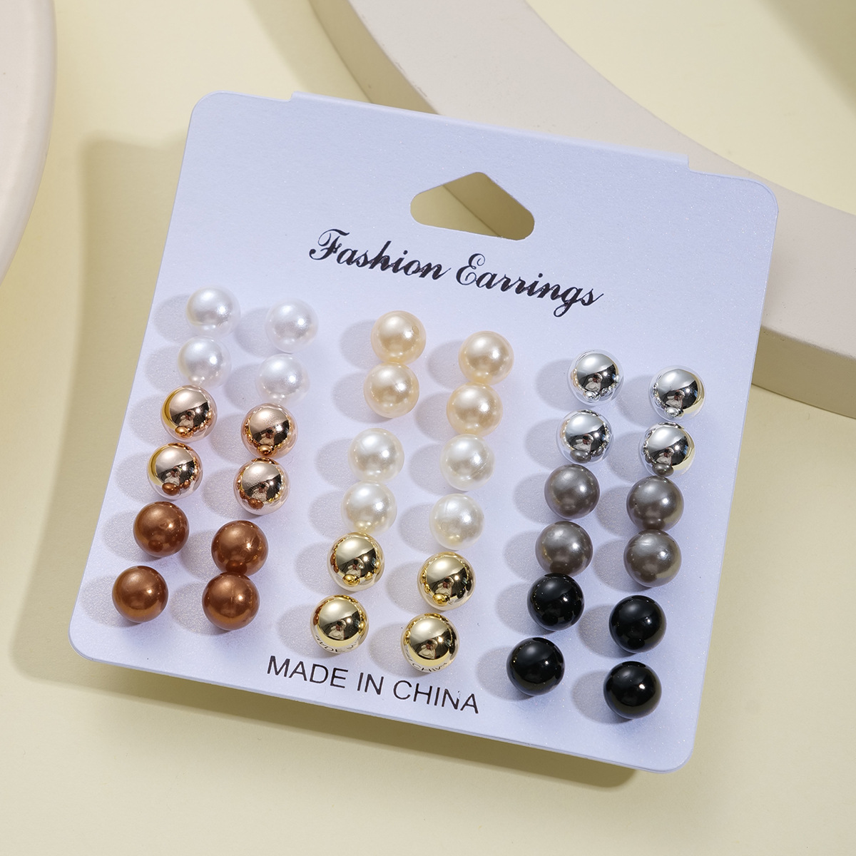 A 18-piece set of fashionable geometric stud earrings for cross-border sales from Europe and America, featuring a commuting imitation pearl stud set Application Scenario