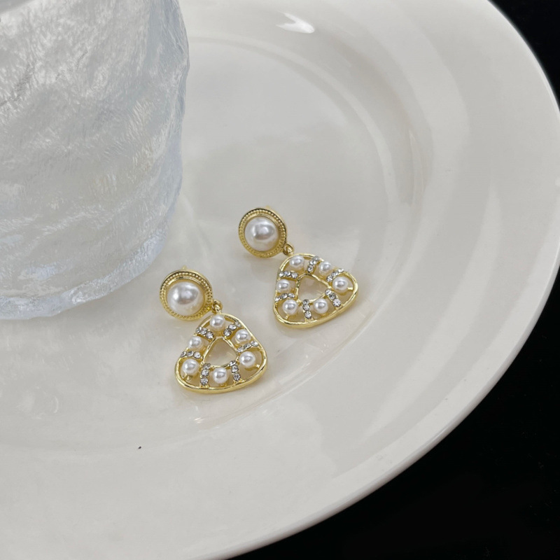 S925 Silver needle Pearl geometric Triangle earrings, with a unique and distinctive hollowed-out design, are a new trendy and sweet ear accessory details Picture