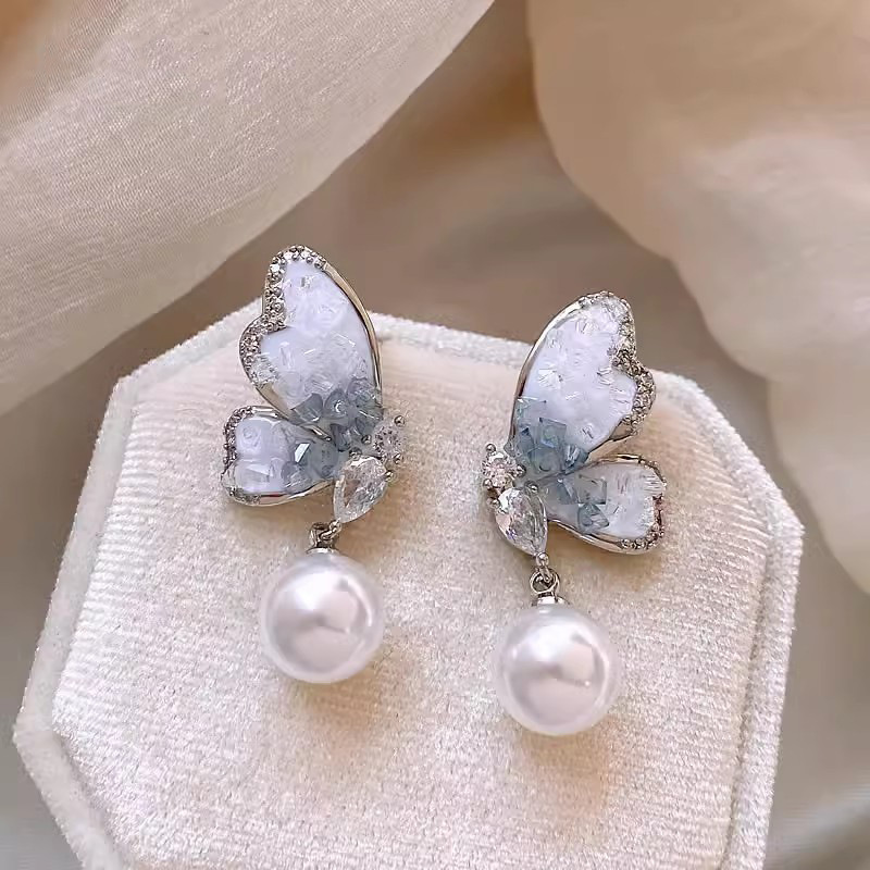 Blue crystal butterfly stud earrings, women's pearl earrings, a niche design with a light luxury and high-end feel, 925 silver needle earrings details Picture