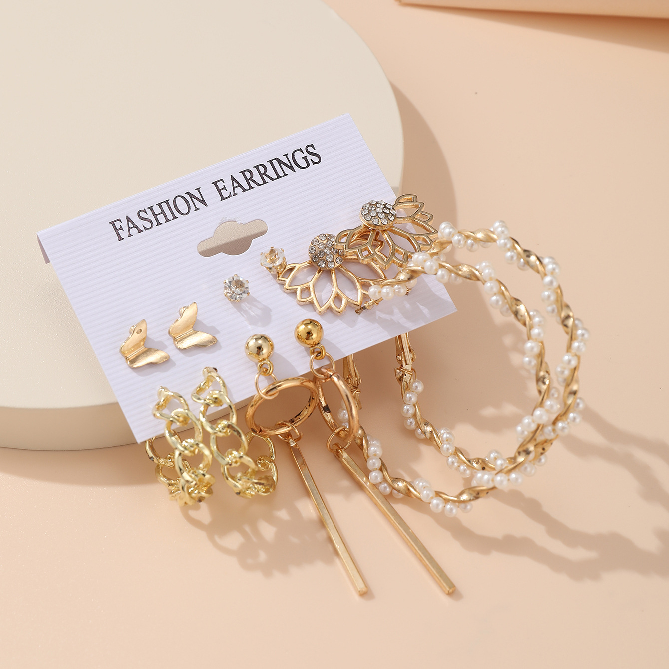 A set of 6 pairs of creative hollowed-out butterfly geometric tassel earrings imitating pearl with cross-border chains from Europe and America Specification drawing