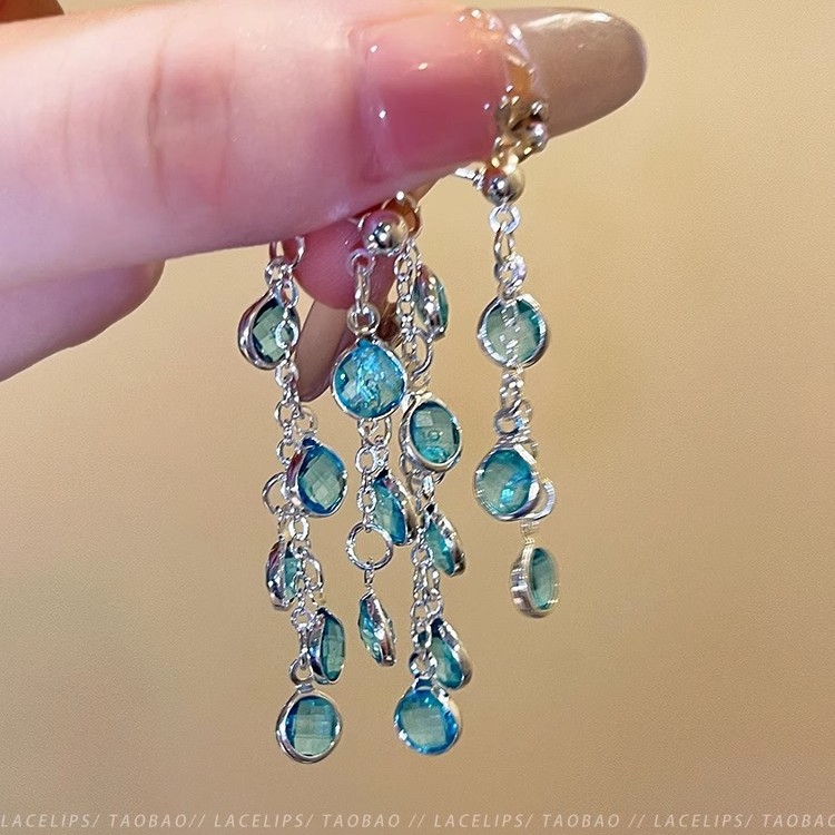 Super Sparkling Glacier Blue Crystal tassel stud earrings, women's light luxury and niche design sense earrings, high-end look, round face slimming earrings details Picture