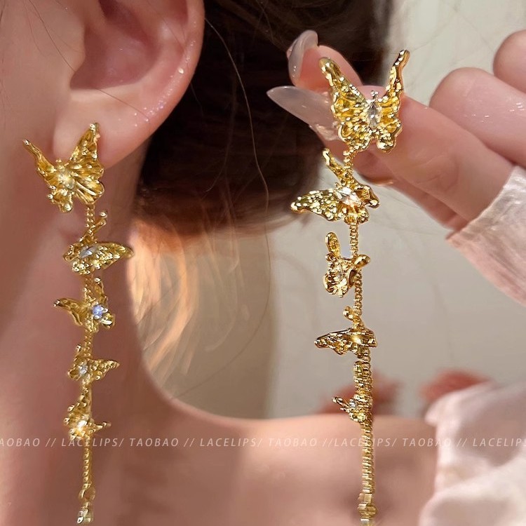 Light luxury metal butterfly rear-hanging tassel stud earrings for women, exaggerated earrings, vacation style, unique and high-end feel, earrings and earrings full figure